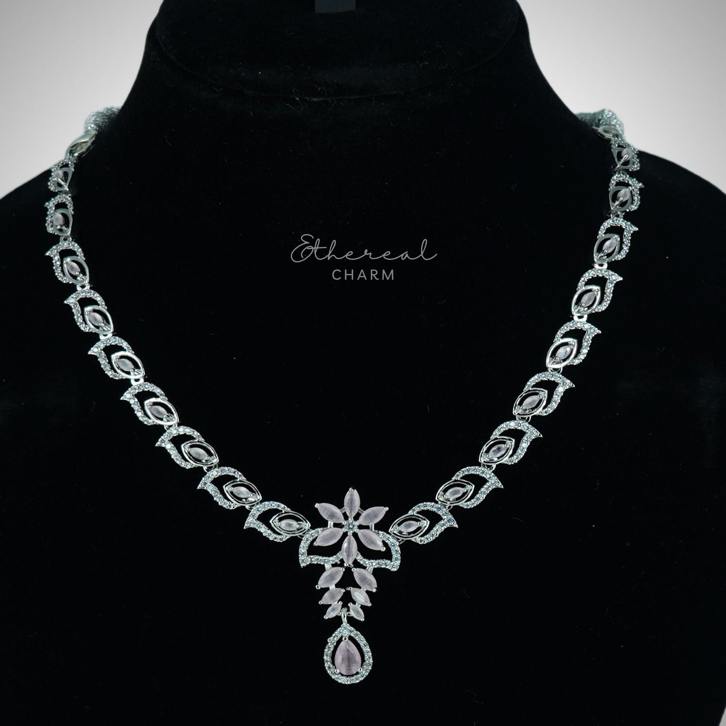 Ethereal Grace: Floral Pendant Necklace Set with Teardrop Accent