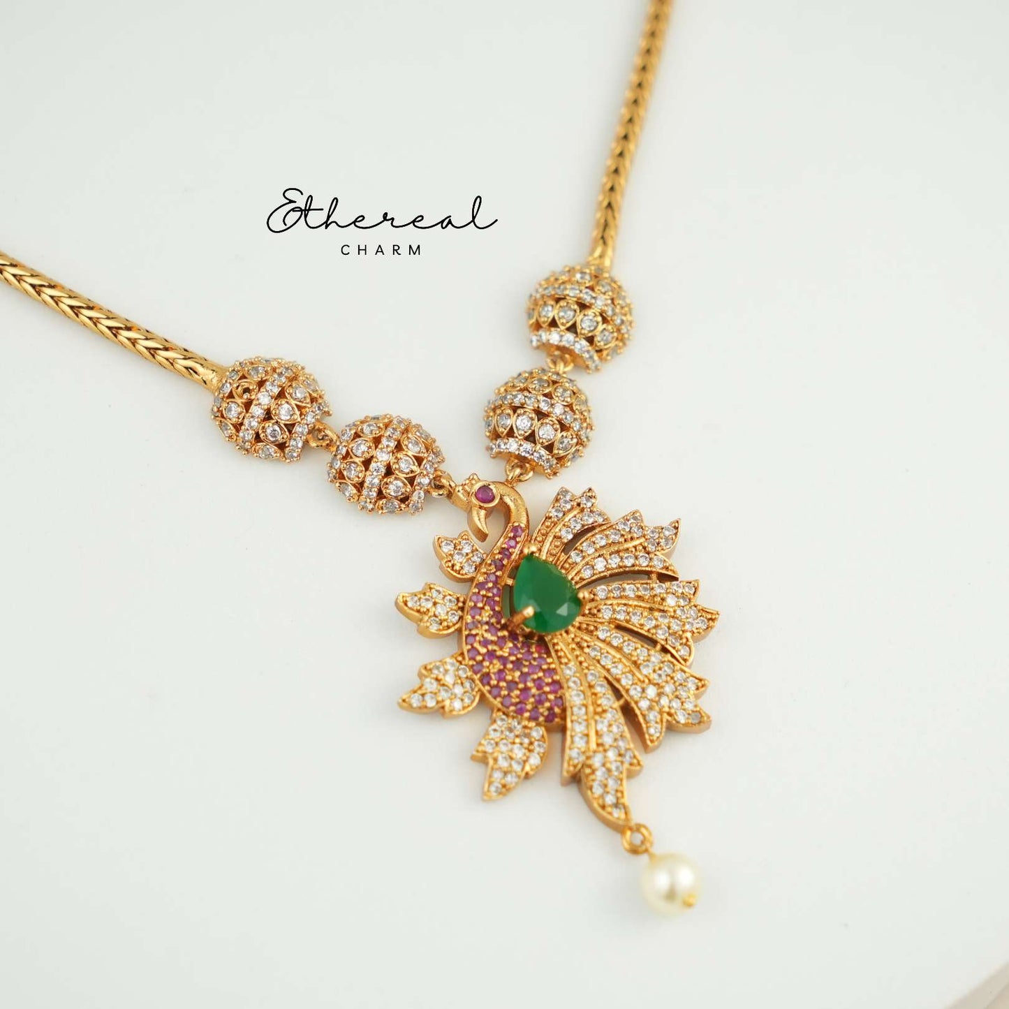 Majestic Peacock Pendant Necklace Set with Green Emerald Accents