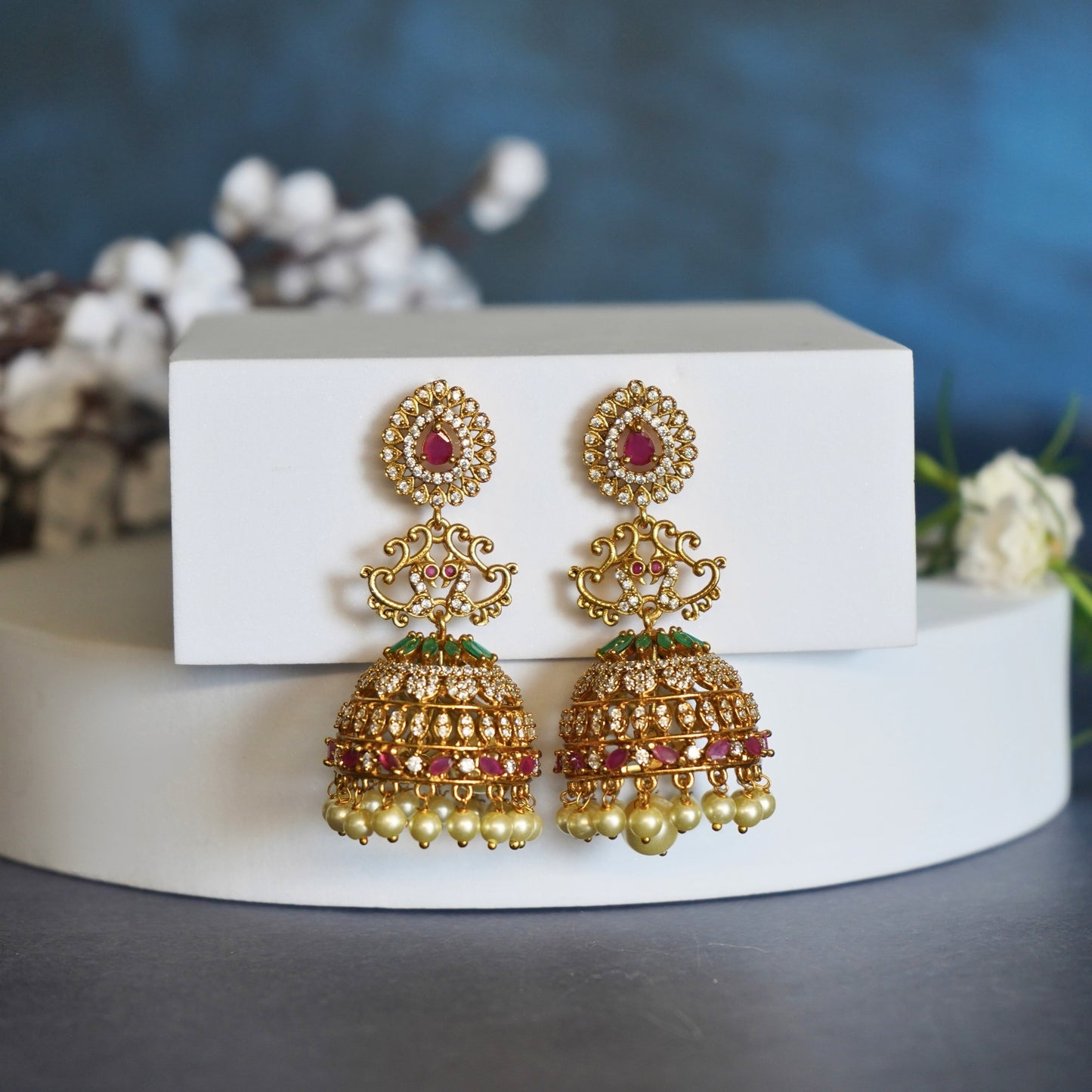 Ornate Gold Jhumka Earrings with Ruby, Emerald, and Pearl Accents