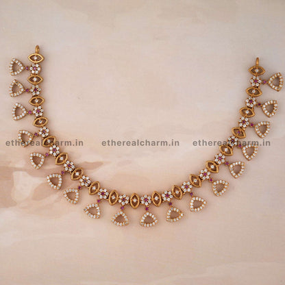Triangular Elegance: Necklace Set with Dainty Motifs and Stone Accents