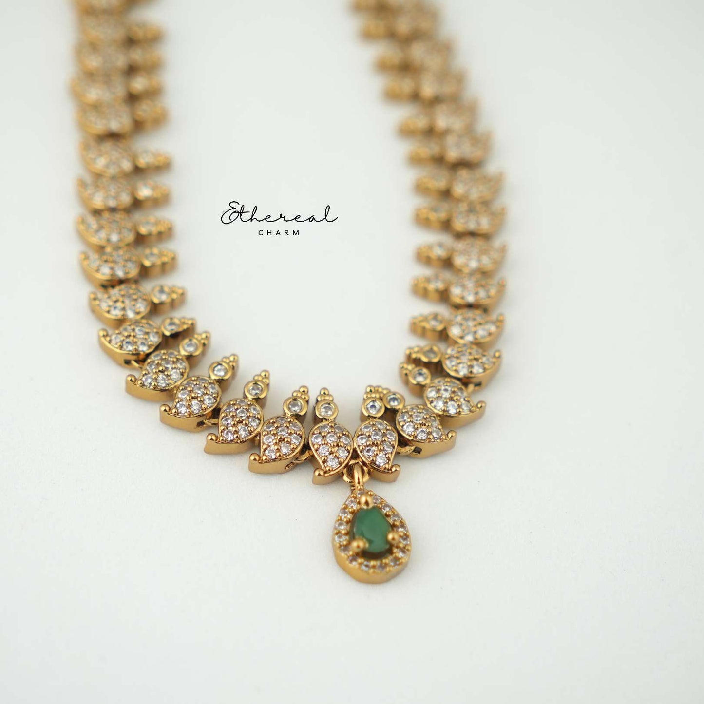 Elegant CZ Necklace with Green Stone Drop