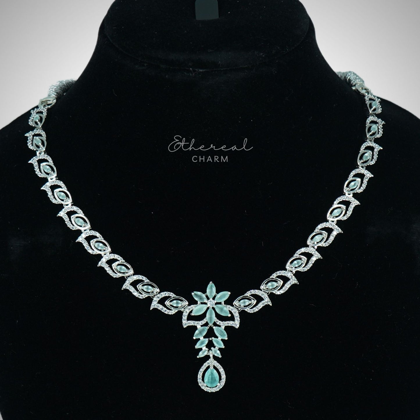 Ethereal Grace: Floral Pendant Necklace Set with Teardrop Accent