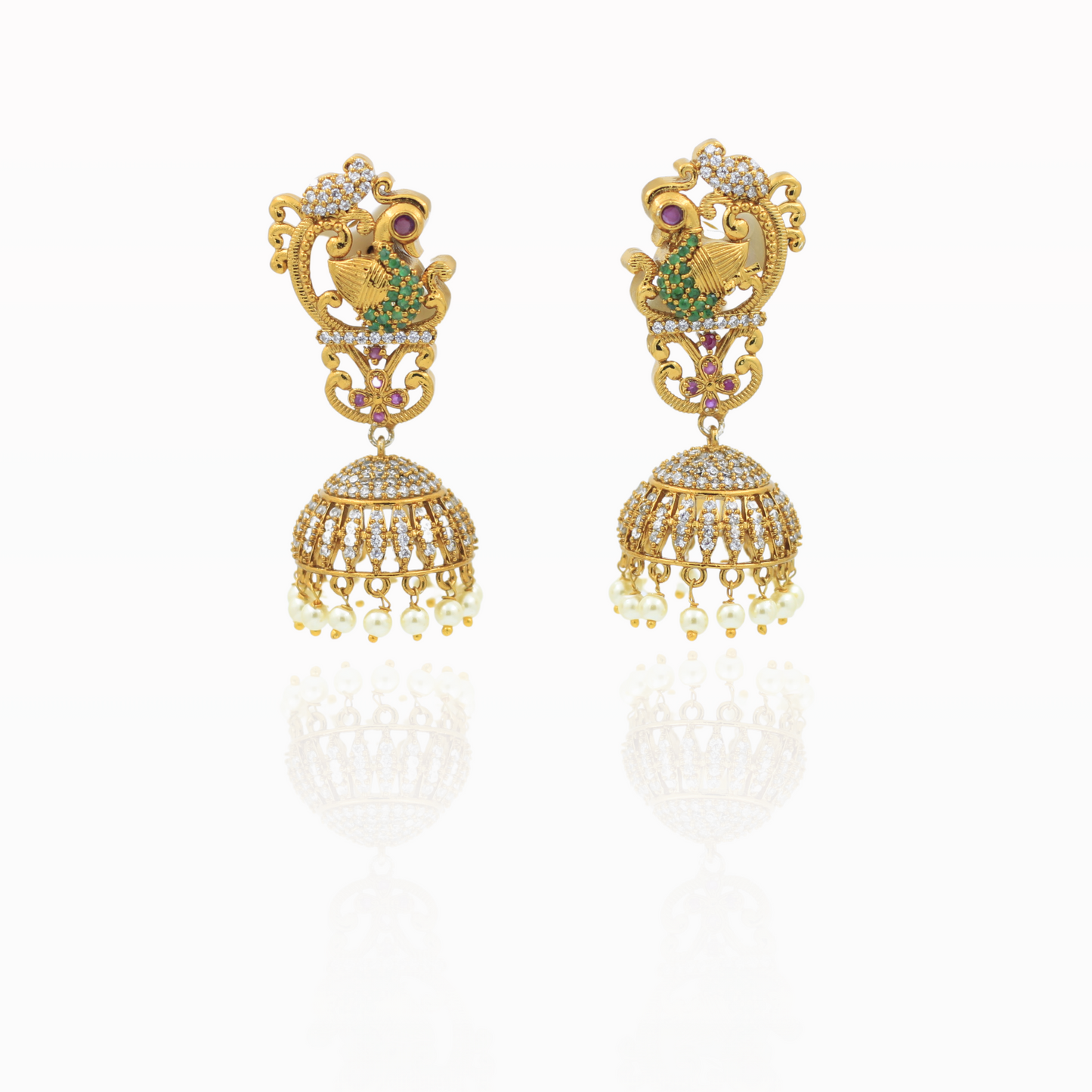 Traditional Gold Jhumka Earrings with Peacock Design and Pearl Accents
