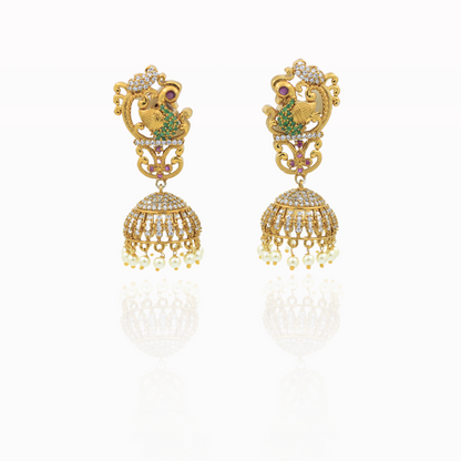 Traditional Gold Jhumka Earrings with Peacock Design and Pearl Accents