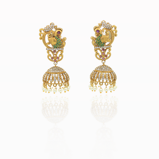 Traditional Gold Jhumka Earrings with Peacock Design and Pearl Accents