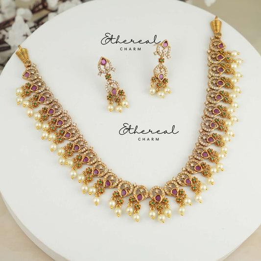 Majestic charm: Elegant Necklace with Ruby and Pearl Drops