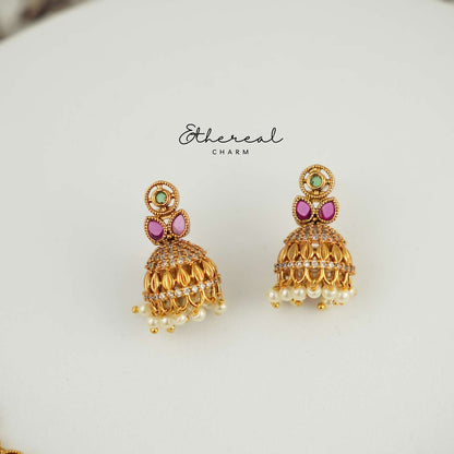 Festive Kundan Necklace with Pearl Drops and Temple Design Accents