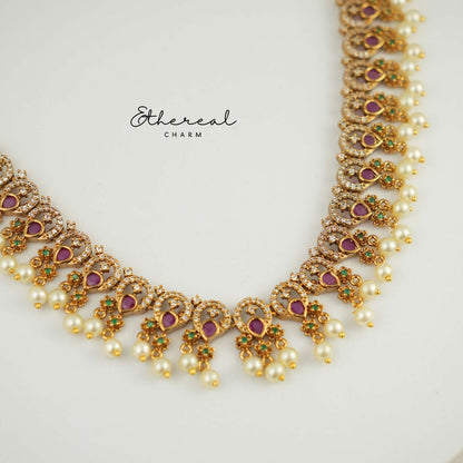Majestic charm: Elegant Necklace with Ruby and Pearl Drops