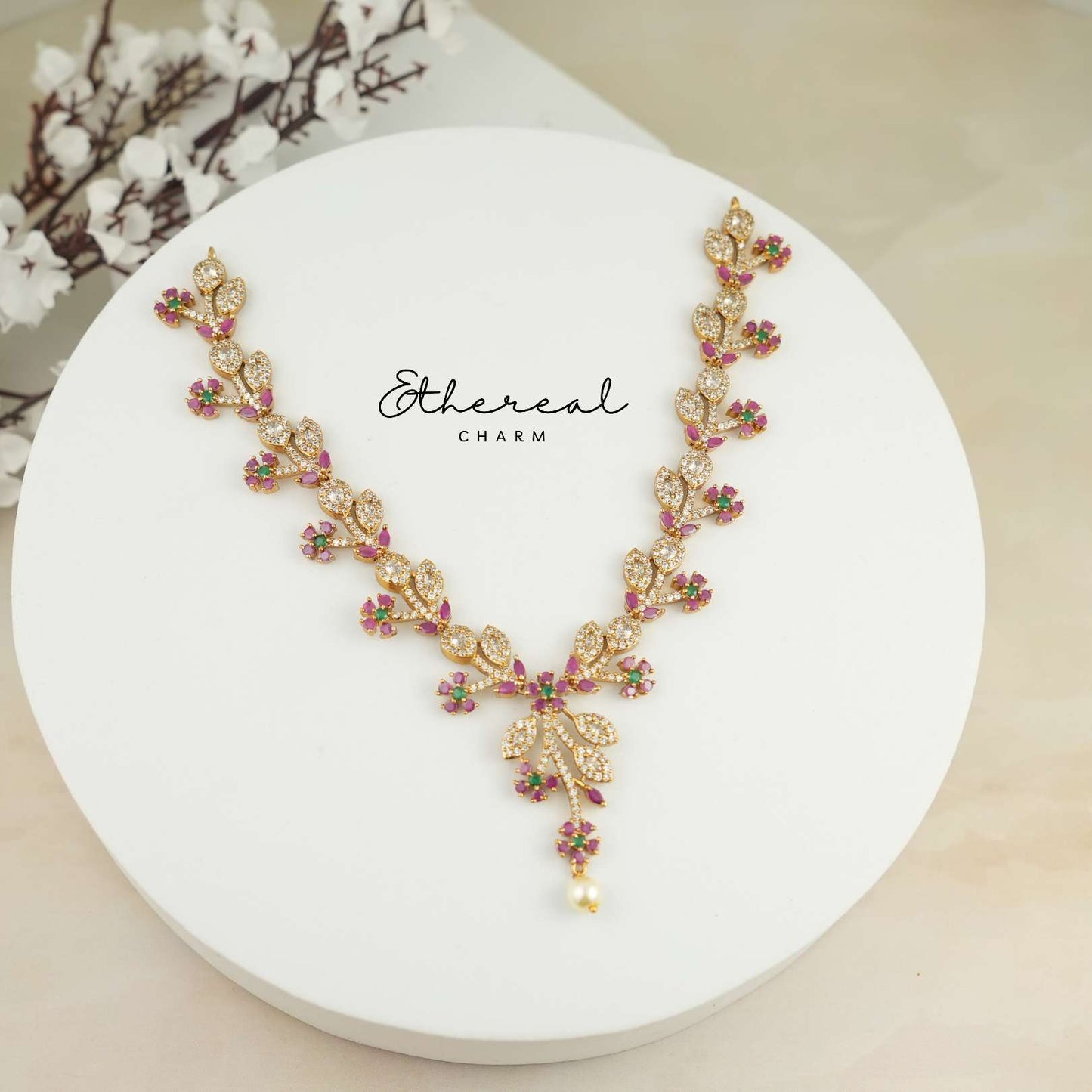 Floral Vine-Inspired Necklace with Ruby and Green Accents