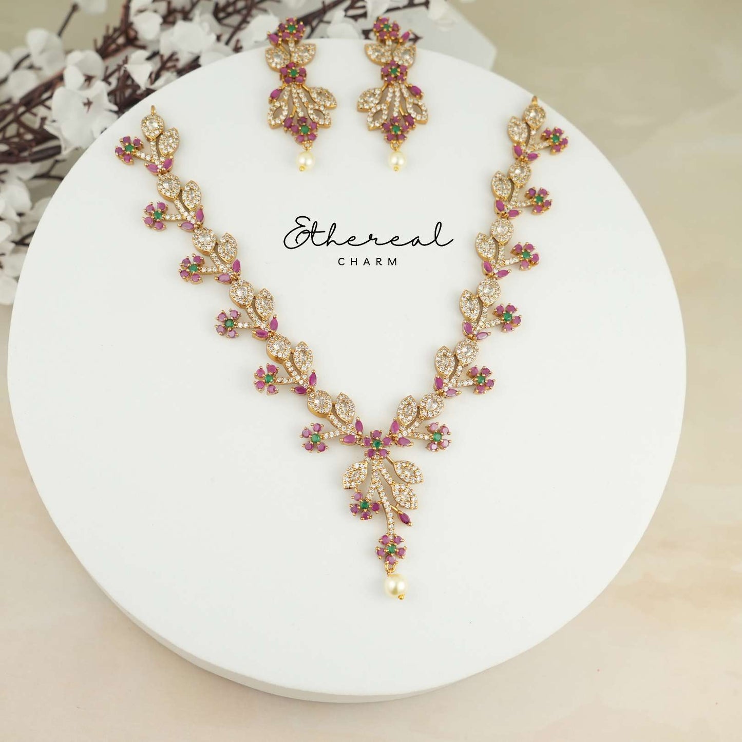 Floral Vine-Inspired Necklace with Ruby and Green Accents