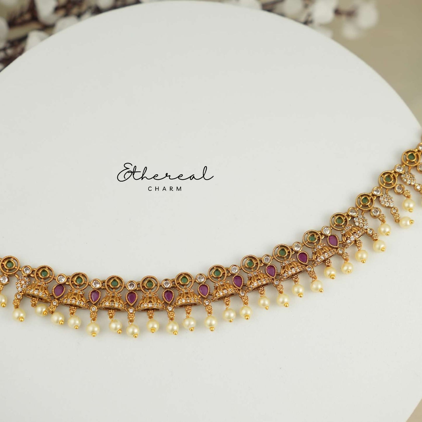 Festive Kundan Necklace with Pearl Drops and Temple Design Accents