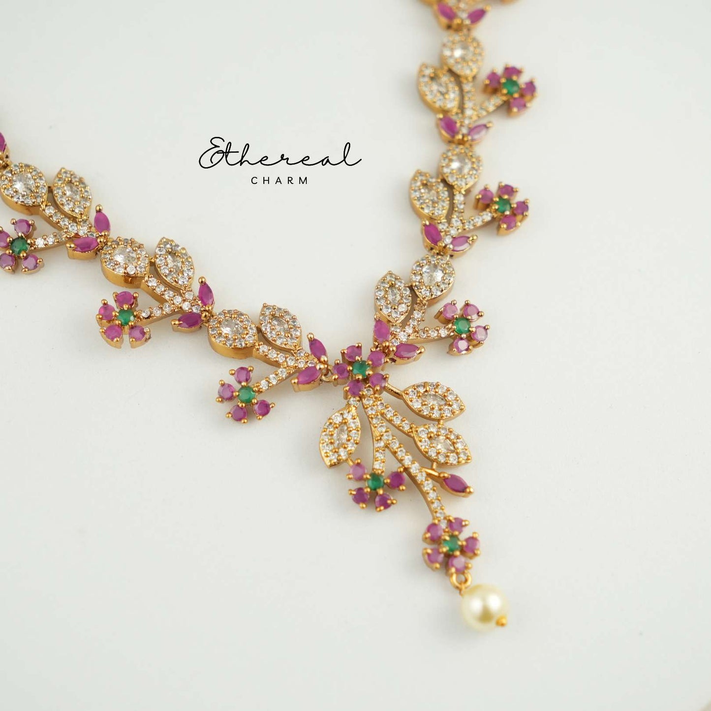 Floral Vine-Inspired Necklace with Ruby and Green Accents