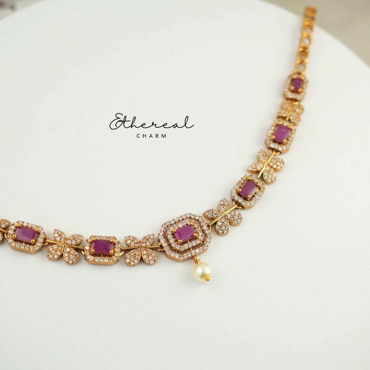 Fluttering Elegance: Necklace Set with Butterfly Motifs and Pearl Accents